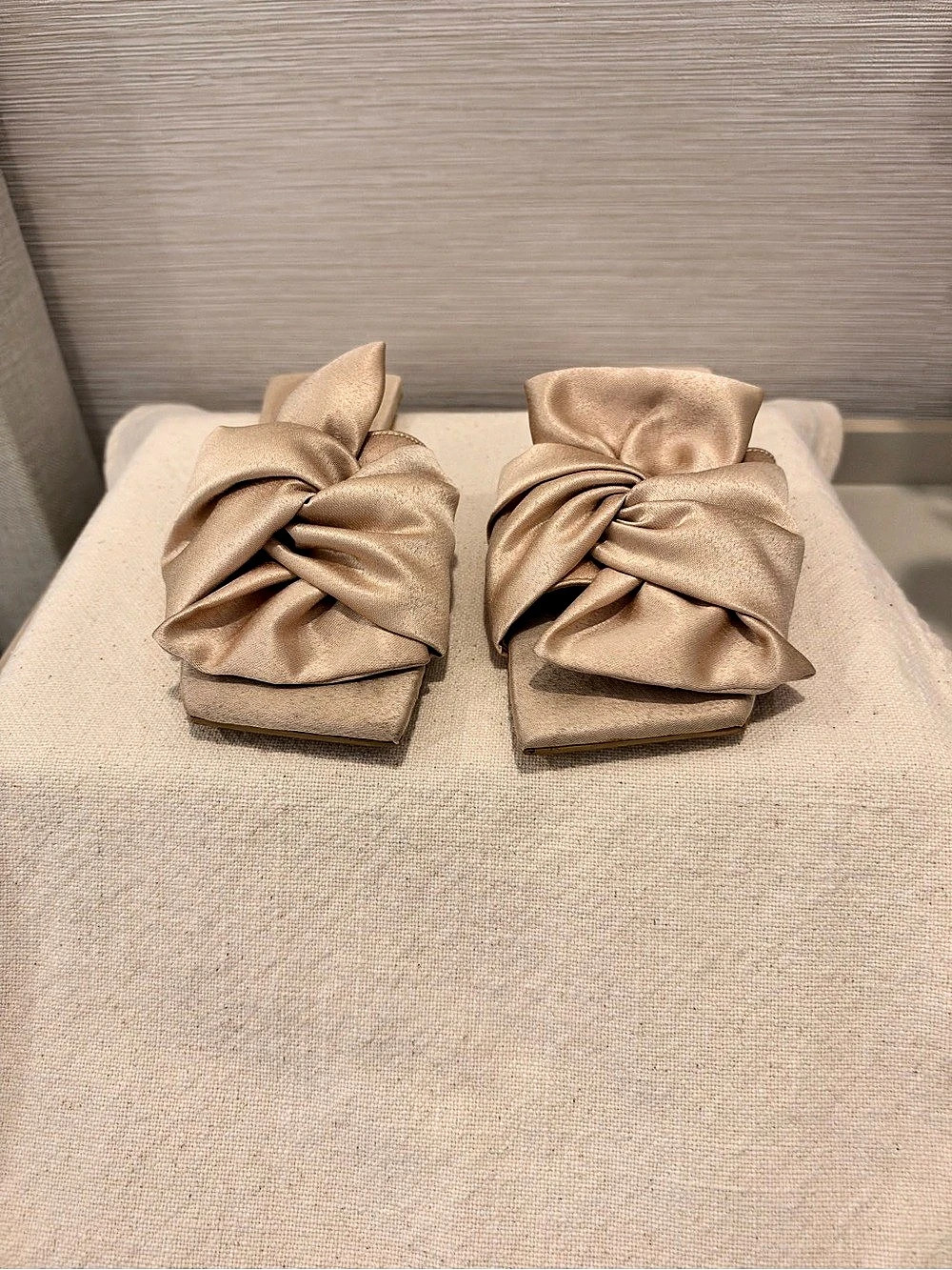 L Cepeda Bow Slide Sandals in champagne.